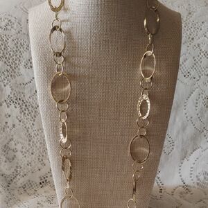 Gold tone long necklace